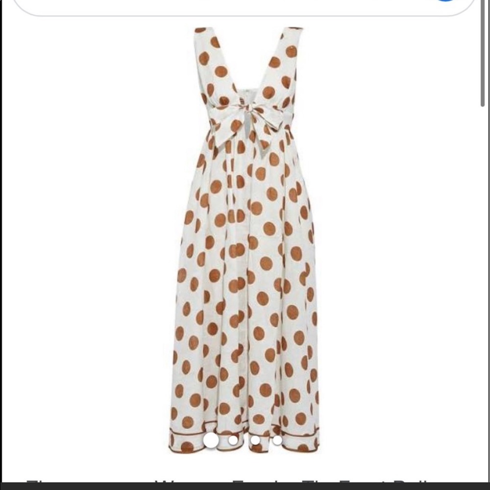 Timeless linen midi dress with a chic polka dot motif